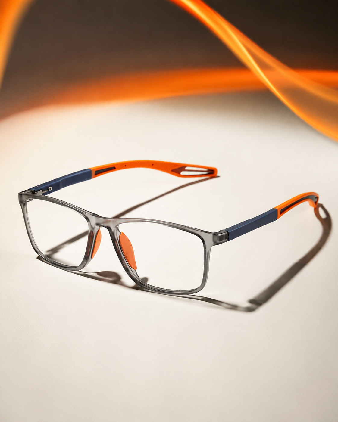 VisionSync glasses in a clean orange and ivory product setting