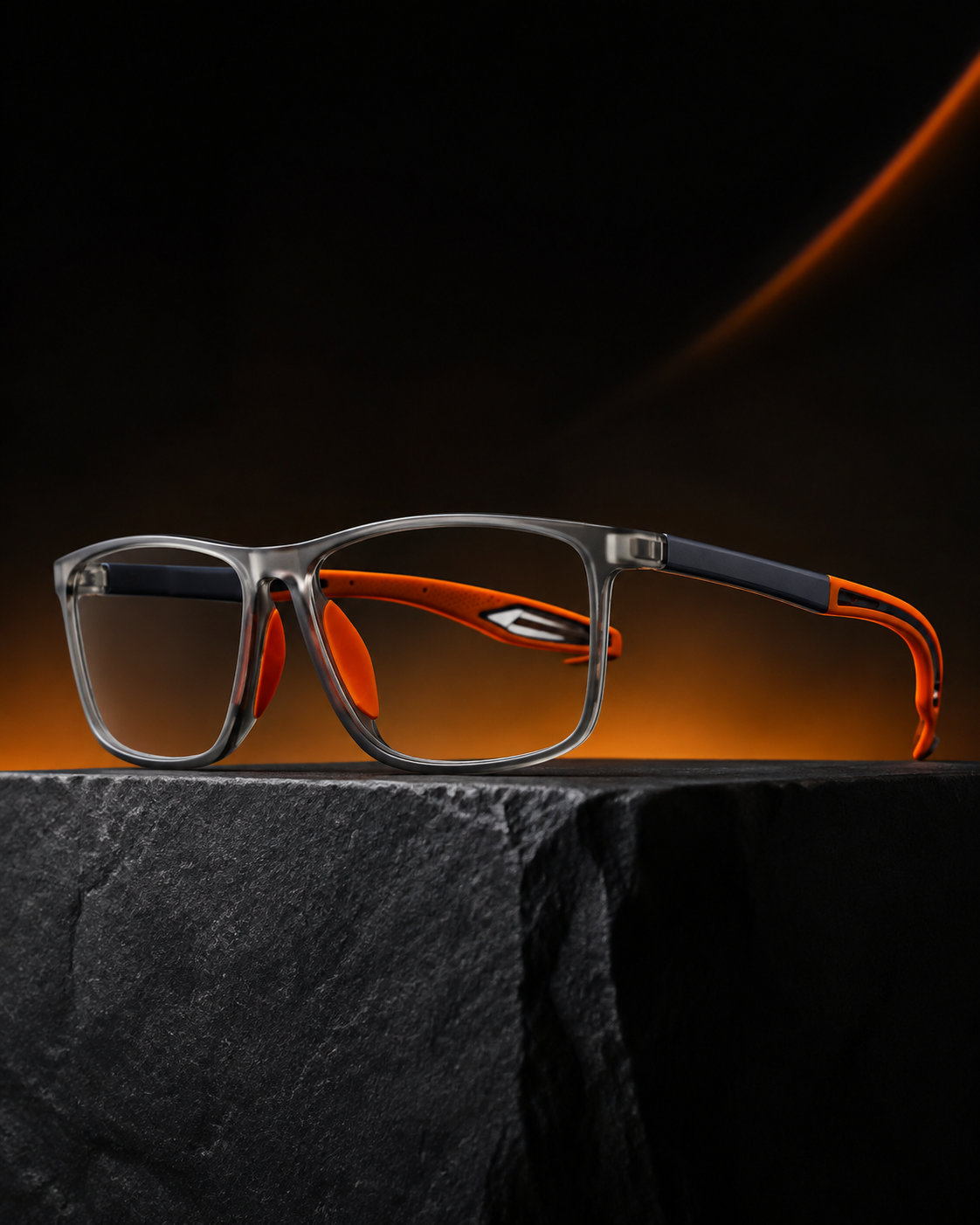 VisionSync multifocal glasses in a premium black and orange studio